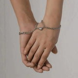 Koppelarmbanden Zilver met Hartverbinding