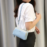 Compacte crossbody telefoontas met verstelbare schouderband