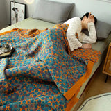 Blauw-Oranje Bedsprei met Geometrisch Bloemenpatroon
