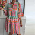 Meerkleurige Tuniekjurk met Geometrische Print en Volantmouwen.