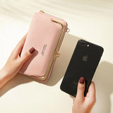 Compacte crossbody telefoontas met verstelbare schouderband
