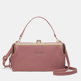 Compacte crossbody telefoontas met verstelbare schouderband