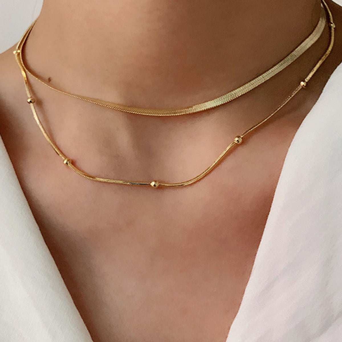 Gelaagde Gouden Ketting met Platte Schakel voor Elegante Look.