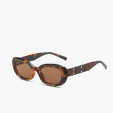 Ovale Schildpad Zonnebril voor Retro en Elegante Look