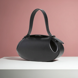 Elegante Handtas met Uniek Rond Design