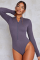 Ribstof Bodysuit met Lange Mouwen en Rits.