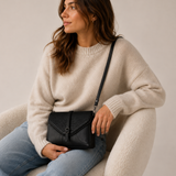 Zwarte crossbodytas met kettingdetail en flap
