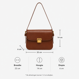 Compacte schoudertas met verstelbare riem en draaisluiting