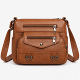 Vintage crossbody tas van kunstleer met hartdetails