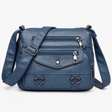 Vintage crossbody tas van kunstleer met hartdetails