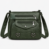 Vintage crossbody tas van kunstleer met hartdetails
