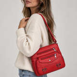 Vintage crossbody tas van kunstleer met hartdetails