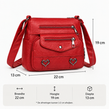 Vintage crossbody tas van kunstleer met hartdetails