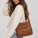 Vintage crossbody tas van kunstleer met hartdetails