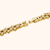 Goudkleurig dameshorloge met verstelbare messing armband
