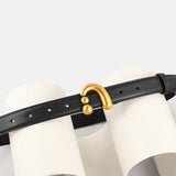 Minimalistische Zwarte Riem met Gouden Detail voor Stijlvolle Look