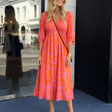 Oranje Midi Jurk met Bloemenprint en V-Hals