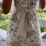 Witte Bloemenprint Bandeau Mini Jurk met Strikdetail.