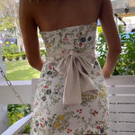 Witte Bloemenprint Bandeau Mini Jurk met Strikdetail.