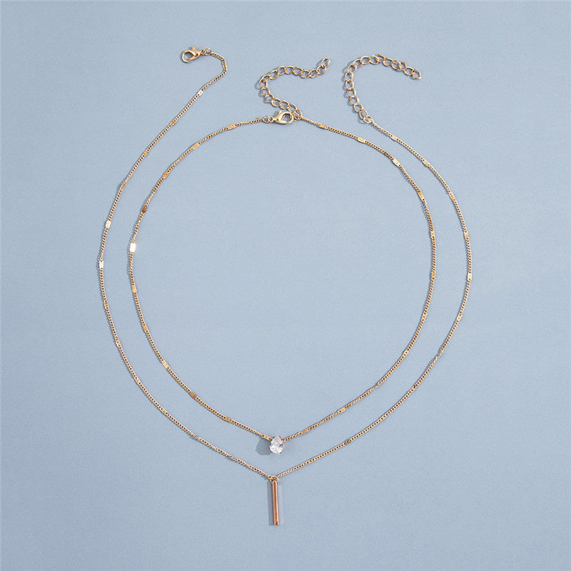 Gelaagde Ketting met Minimalistische Hangers.