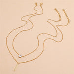 Gelaagde Ketting met Minimalistische Hangers.