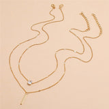Gelaagde Ketting met Minimalistische Hangers.