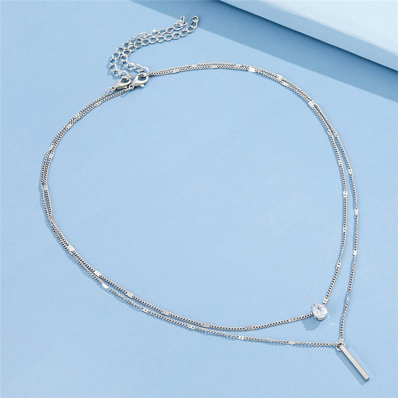 Gelaagde Ketting met Minimalistische Hangers.