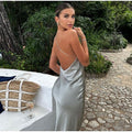 Zilverkleurige Halter Maxi Jurk met Open Rug.