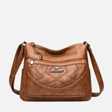 Dames crossbody tas van kunstleer met ritsvakken