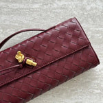 Gevlochten Clutch Tas met Luxe Sluiting.