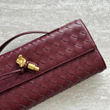 Gevlochten Clutch Tas met Luxe Sluiting.