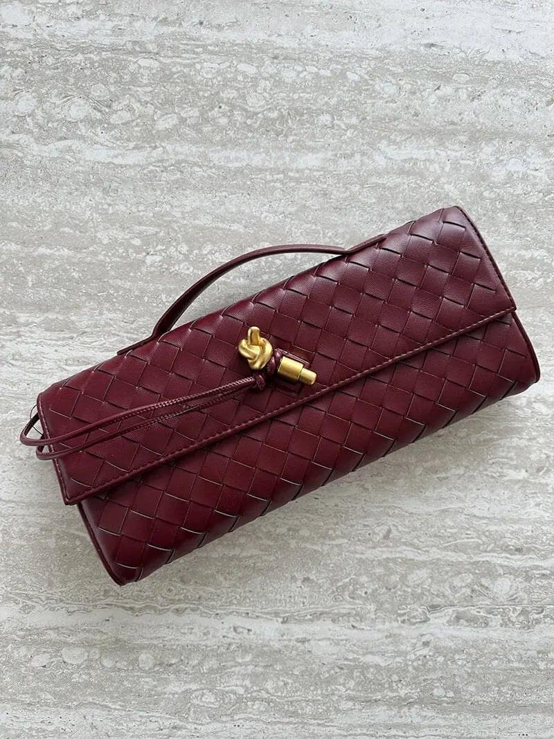 Gevlochten Clutch Tas met Luxe Sluiting.