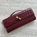 Gevlochten Clutch Tas met Luxe Sluiting.