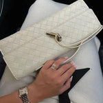 Gevlochten Clutch Tas met Luxe Sluiting.