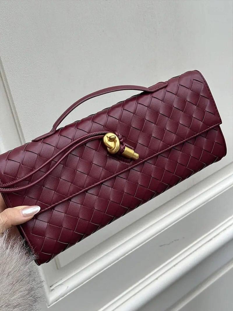 Gevlochten Clutch Tas met Luxe Sluiting.