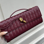 Gevlochten Clutch Tas met Luxe Sluiting.