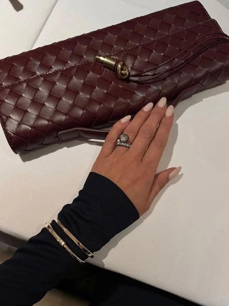 Gevlochten Clutch Tas met Luxe Sluiting.