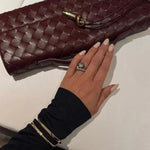 Gevlochten Clutch Tas met Luxe Sluiting.