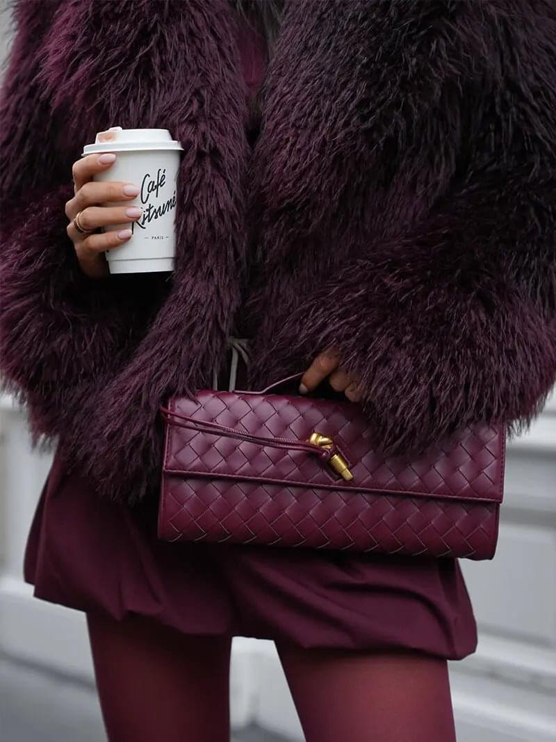 Gevlochten Clutch Tas met Luxe Sluiting.