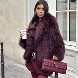 Gevlochten Clutch Tas met Luxe Sluiting.