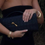 Gevlochten Clutch Tas met Luxe Sluiting.