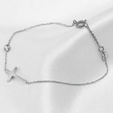 Dames schakelarmband met fijn kruisdesign, verstelbaar