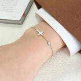 Dames schakelarmband met fijn kruisdesign, verstelbaar