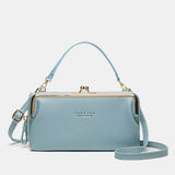 Compacte crossbody telefoontas met verstelbare schouderband
