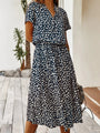 Marineblauwe Midi Jurk met Dierenprint en Taillekoord.