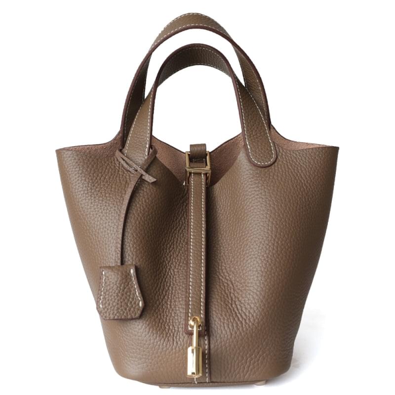 Compacte Handtas met Structuur en Luxe Afwerking.