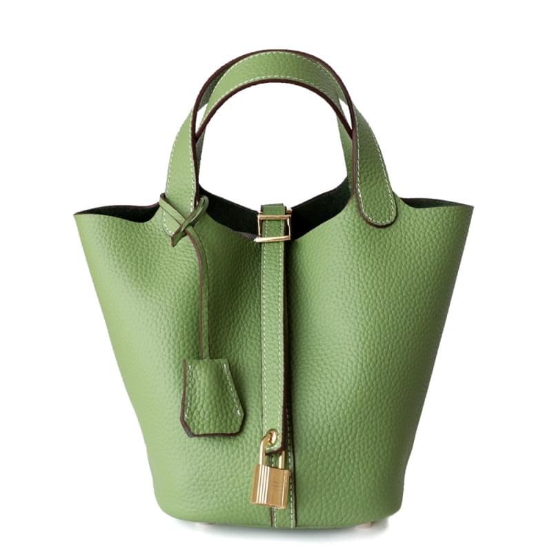 Compacte Handtas met Structuur en Luxe Afwerking.