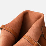 Compacte Handtas met Structuur en Luxe Afwerking.