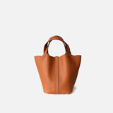 Compacte Handtas met Structuur en Luxe Afwerking.