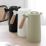 Groene Thermoskan met Houten Handvat